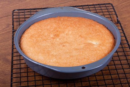 A baked cake just cooling before frosting and decorating