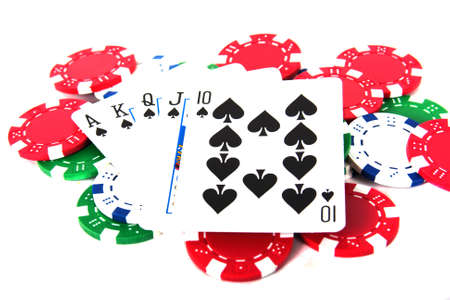 Ace high royal straight flush poker hand with poker chipsの写真素材
