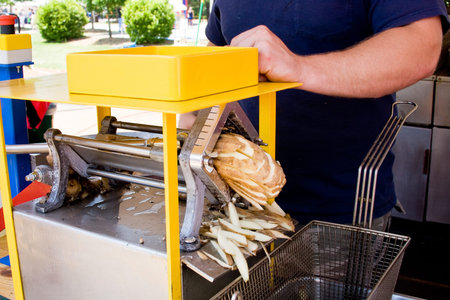 Cutting french fries with a commercial machine
