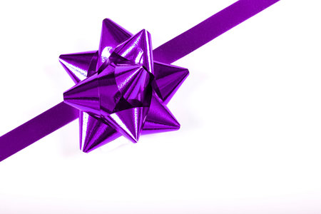 Purple ribbon and bow for a perfect gift wrap の写真素材
