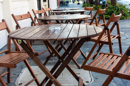 Outdoor restaurant sidewalk cafe simple wooden seating area