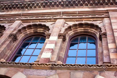 Beautiful old architecture showing stonework and window designの写真素材