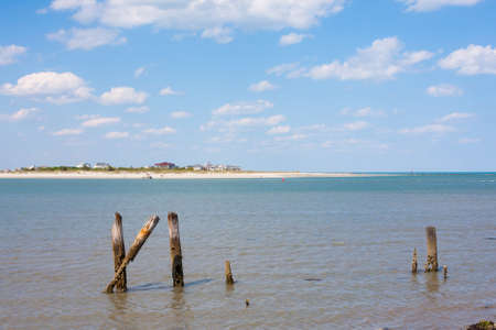 Ocean landscape with remains of old pierの写真素材