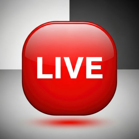 A vibrant red, highly polished button with the word 'LIVE' displayed in bold white text. The button has a glassy, three-dimensional appearance, suggesting a call to action for live content. It's presented against a striking gradient background that transitions from light to dark gray, suitable for media interfaces.の素材