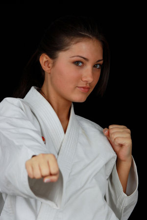Beautiful young teen in karate suitの写真素材