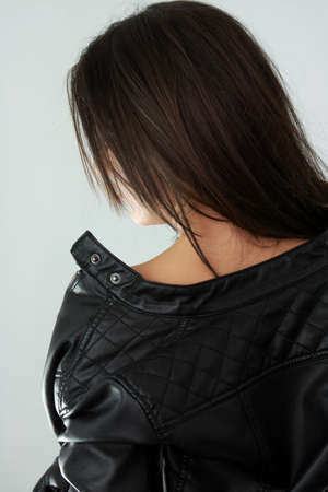 Beautiful young woman in blackの写真素材