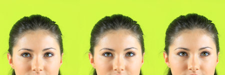 Close-up portrait of a beautiful teenager. Looking up into the corner.の写真素材