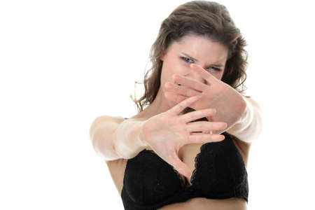 Afraid woman isolated on the whiteの写真素材