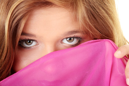 Beautiful brunette girl in hot pink. Isolated on white backgroundの写真素材