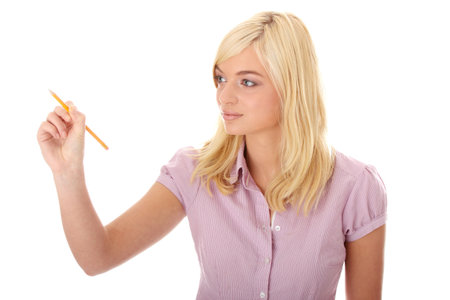 Teen woman writing on abstract screan (glass)の写真素材