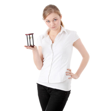 Young business woman with hourglass - time concept
