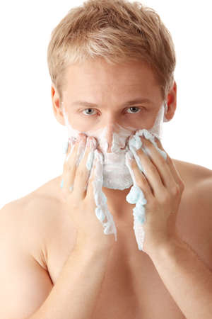Man shaving isolated on white backgroundの写真素材