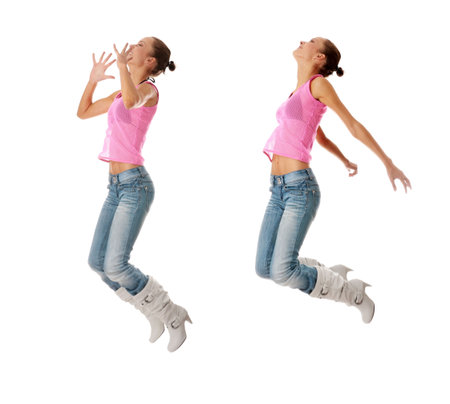 Jumping girl in jeans and pink shirt isolated on white background
