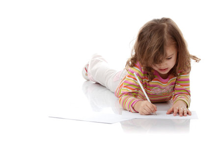 Portrait of a 5 year old girl isolated on white backgroundの写真素材