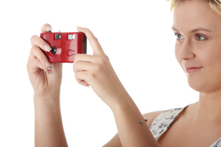 Portrait of a beautiful young woman talking a picture, isolated
