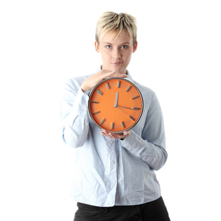 Woman holding big alarm clock, isolated on white background