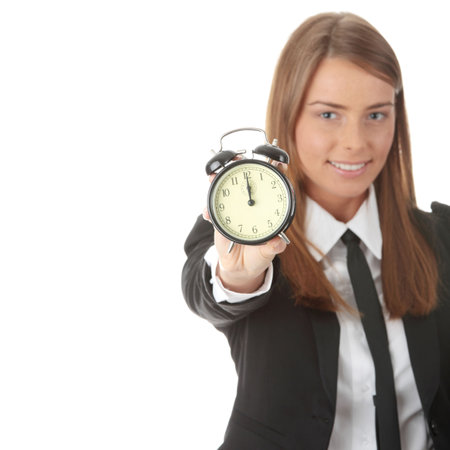A young woman with alarm clock isolated
の写真素材