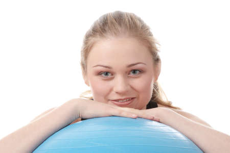 Young happy woman doing fitness exercise, isolated on white
の写真素材