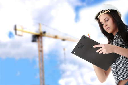 Engineer woman in white helmet