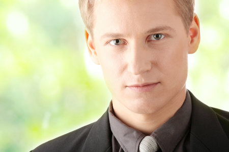 Closeup of a smart handsome business manの写真素材