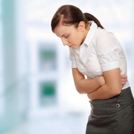 Business woman with stomach issues
の写真素材