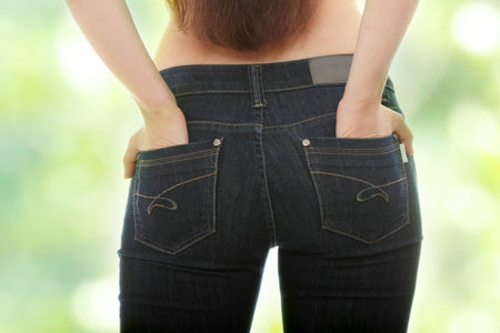 Young caucasian woman body in jeans