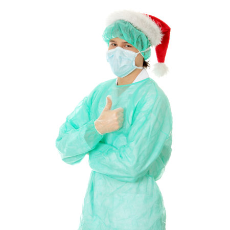 Handsome young doctor (surgeon) in snata hat, isolated on white backgroundの写真素材