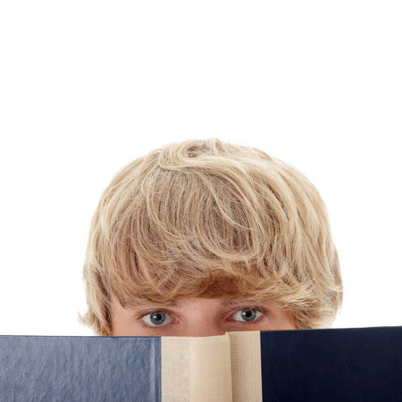 Teen man reading book , isolated on white background