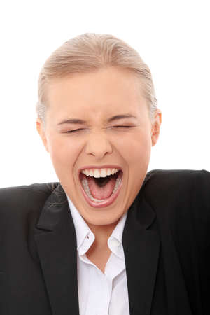 Young business woman shouting, isolated on white backgroundの写真素材