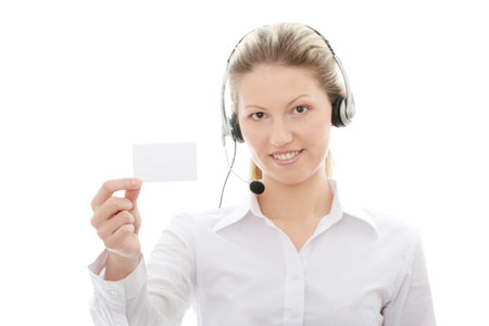Call center woman with headset showing business card. Beautiful smiling caucasian woman isolated on...