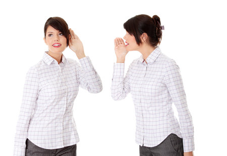 Businesswoman whispering gossip ,isolated on white