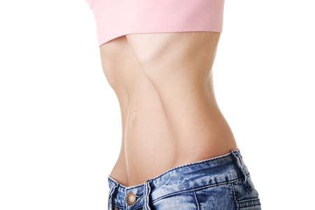 Belly of beautiful young female with anorexia の写真素材