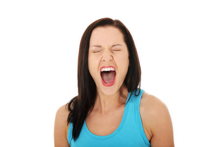 Stressed or angry woman screaming loud の写真素材