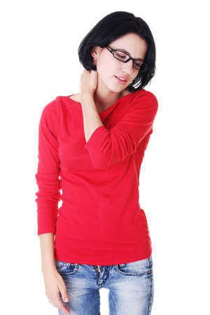 Young woman holding hand on her neck. Neck pain conceptの写真素材