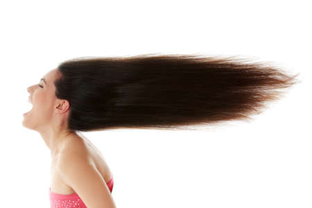 Young beautiful caucasian woman with long hairs の写真素材