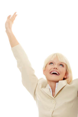 Young happy businesswoman with hands up, isolated on white の写真素材