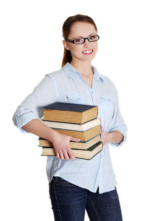 Young happy caucasian woman (student) with books, isolatedの写真素材