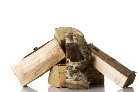 Cut log fire wood from birch-tree. Isolated on white.の写真素材