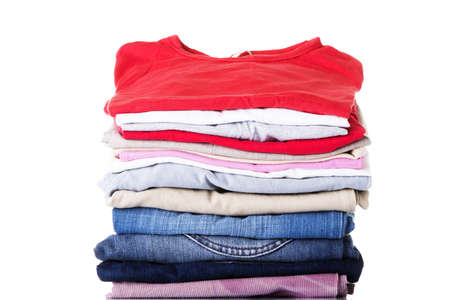 Stack of clothing isolated on white の写真素材