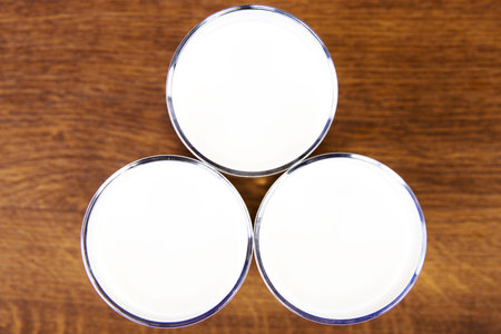 Glass of milk on tableの写真素材