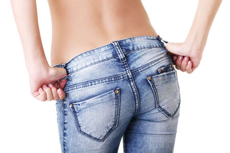 Fit female butt in jeans, isolated on white の写真素材