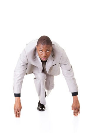 Handsome businessman ready to start.  Isolated on white. の写真素材