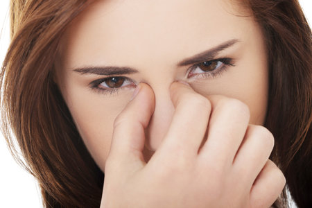 Young woman with sinus pressure painの写真素材
