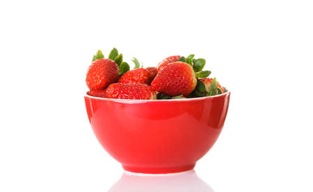 Fresh red strawberries in a bowl.の写真素材