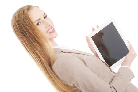 Beautiful caucasian business woman holding tablet. Isolated on white.