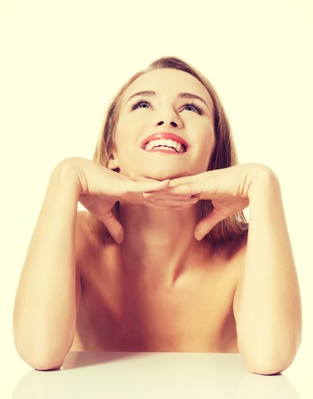 Portrait of beautiful topless caucasian woman. Spa concept. Isolated on white.の写真素材