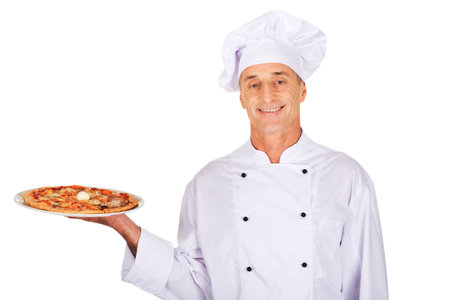 Chef baker with italian pizza on plate.の写真素材