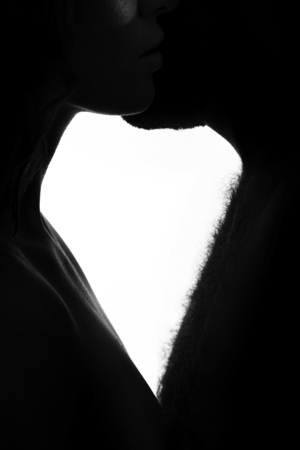 Black and white photo of young sensual couple kissingの写真素材