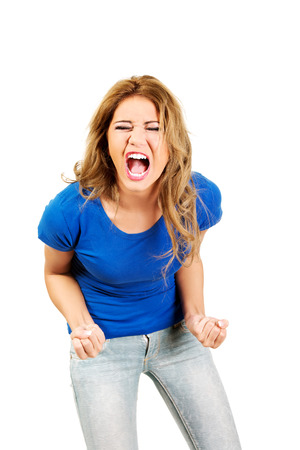 Young beautiful frustrated angry woman.の写真素材