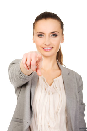 Beautiful confident businesswoman pointing on you.の写真素材